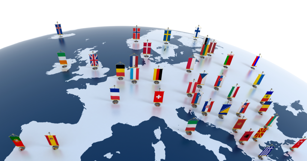 ヨーロッパを表す図。地球儀にヨーロッパ諸国の国旗が刺さっている様子。